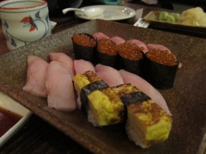 Nigiri of hamachi, tamago, toro, and ikura