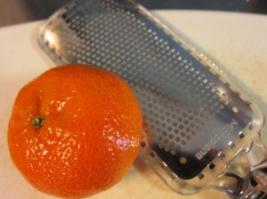 Grate over orange zest