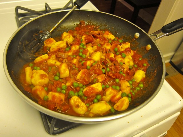 toss gnocchi and peas in the sauce