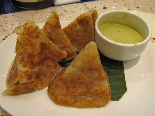 Roti with green curry sauce