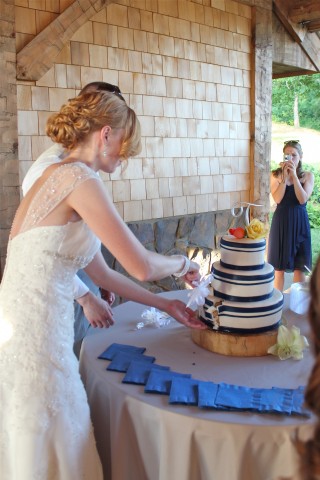 Bryan and Caitlin cutting the cake