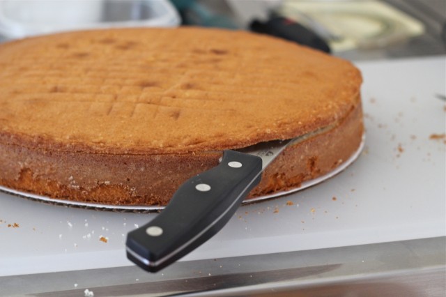 Trimming the muffin top from the bottom layer